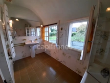 Maison à vendre sur sous-sol total - secteur Plogonnec - Surface habitable 134 m2 - 6 pièces- 4 chambres - 1 bureau- véranda- jardin-parcelle de 2794 m2 