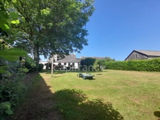 Maison à vendre 4 pièces PLOGONNEC (29180)- Surface habitable 131.82 m2 -parcelle de 13963m2 + bois de 9018m2- Dépendances.