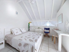 EN EXCLUSIVITÉ À VENDRE MAISON DE VILLE VUE MER  AVEC PISCINE ET JARDIN SUR OYSTER POND, SAINT-MARTIN (97150)