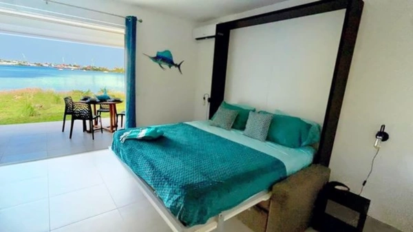 À VENDRE STUDIO RÉCENT EN REZ-DE-JARDIN AVEC VUE LAGON SECTEUR BELLEVUE, SAINT-MARTIN (97150)