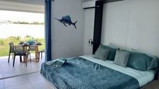 À VENDRE STUDIO RÉCENT EN REZ-DE-JARDIN AVEC VUE LAGON SECTEUR BELLEVUE, SAINT-MARTIN (97150)