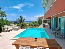 VILLA À VENDRE 3 CHAMBRES + STUDIO AVEC VUE MER ET PISCINE SUR OYSTER POND, SAINT-MARTIN (97150)