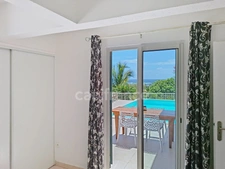 VILLA À VENDRE 3 CHAMBRES + STUDIO AVEC VUE MER ET PISCINE SUR OYSTER POND, SAINT-MARTIN (97150)