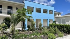 À VENDRE STUDIO RÉCENT EN REZ-DE-JARDIN AVEC VUE LAGON SECTEUR BELLEVUE, SAINT-MARTIN (97150)