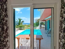 VILLA À VENDRE 3 CHAMBRES + STUDIO AVEC VUE MER ET PISCINE SUR OYSTER POND, SAINT-MARTIN (97150)