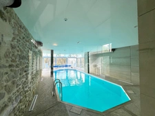 FOR SALE - ST LÉONARD - CHARACTERFUL STONE PROPERTY - 4.75 HECTARES - 7 APARTMENTS - INDOOR POOL - TECHNICAL ROOM