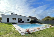 Maison à vendre 4 pièces  (72)Maison contemporaine à toit plat 98 m² habitables, 3 chambres, terrain de 700 m², piscine chauffée 