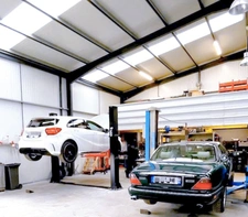 Garage automobile à vendre avec ses murs sur vaste terrain - proche RN20 ARPAJON (91)