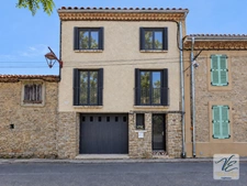 Maison rénovée à Siran – 3 chambres, terrasse, cour et grand garage de 60 m²