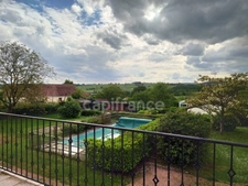 Family home of over 220 m² with 5 bedrooms, swimming pool, sauna, enclosed grounds, unobstructed views