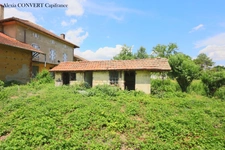 Dépendance 115m² avec 946m² de terrain proche centre village Foissiat