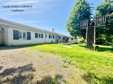 Maison de plain-pied, 4 chambres, double garage et jardin
