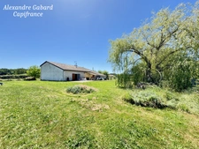 Corps de ferme rénové avec grange attenante - 4 chambres - Terrain de plus d'un hectare