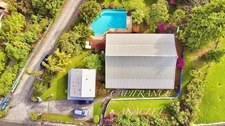 ❤️COUP DE CŒUR❤️ À vendre – Villa contemporaine avec piscine à débordement, vue mer et dépendance locative 97222 CASE-PILOTE