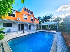 Villa and its T2 apartment with swimming pool and landscaped garden for sale in SAINT-FRANCOIS (971)