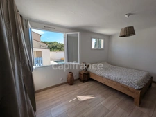 Maison de 93 m² climatisée avec piscine et dépendance de 50 m² sur la commune de SAINT GILLES (30).