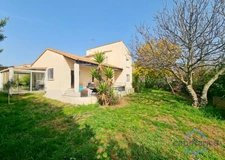 Maison individuelle rénovée de 110m² avec 4 pièces + une véranda sur un terrain arboré de 700m² - Garage