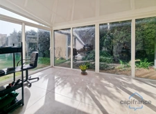 Maison individuelle rénovée de 110m² avec 4 pièces + une véranda sur un terrain arboré de 700m² - Garage