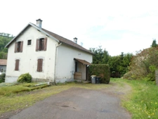 CORRAVILLERS (70) Maison à conforter divisée en deux appartents T3 , terrain 5200 m² environ.