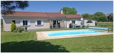 Plain-pied lumineux avec piscine dans secteur calme
