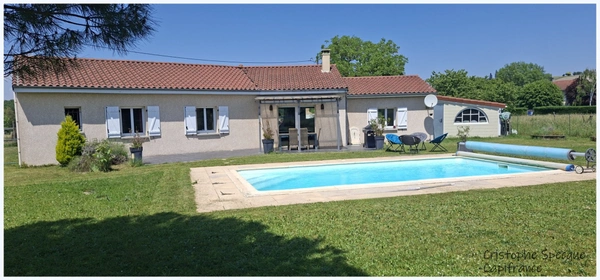 Plain-pied lumineux avec piscine dans secteur calme