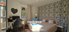 Maison individuelle de plain-pied 130 m² avec jardin clos et garage.