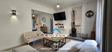 Maison individuelle de plain-pied 130 m² avec jardin clos et garage.
