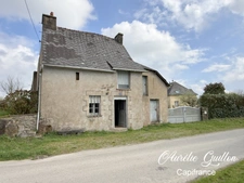 Maison en pierre avec garage et beau terrain de 1300 m2 en zone constructible avec puits – Ploërmel