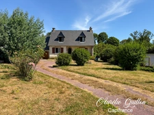 Maison familiale 129 m² – 4 chambres – Garage – Terrain arboré de 4 168 m² – Mauron