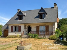 Maison familiale 129 m² – 4 chambres – Garage – Terrain arboré de 4 168 m² – Mauron
