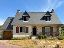 Maison familiale 129 m² – 4 chambres – Garage – Terrain arboré de 4 168 m² – Mauron