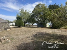 Maison en pierre à réhabiliter – terrain constructible 1 300 m², garage – Ploërmel