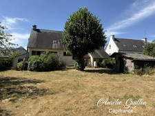 Maison familiale 129 m² – 4 chambres – Garage – Terrain arboré de 4 168 m² – Mauron
