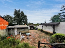 A 5 mn de MARCIGNY – Maison familiale d’environ 163 m² habitables avec terrasse, dépendance, garages et terrain de 1 641 m².