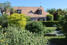 Maison  familiale de 145 m² sur un terrain paysager de 1920 m²