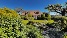Maison  familiale de 145 m² sur un terrain paysager de 1920 m²