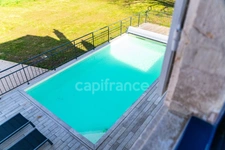 Property for sale comprising a main house and a second house with swimming pool and garden
