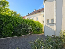 Maison de ville à vendre avec jardin et parking