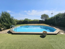 Belle maison 5 pièces, 4 chambres, piscine, garage, vue mer, terrain 967 m2 à BIGUGLIA (20620)