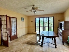 MIRANDE(32): MAISON TRADITIONNELLE 1975, 4 chambres, AU CALME, piscine couverte, 3000m2 terrain, impasse