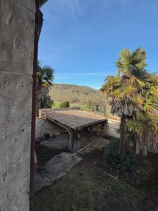 Near Plaisance du Gers (32), elegant 307m2 stone village house with 150m2 enclosed garden, no work required.