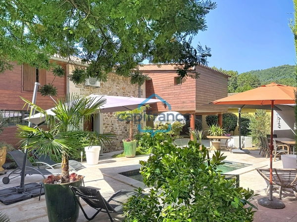  A vendre  Anduze Mas en pierre 10 pièces 446 m2 dont 1 appart.132m2 + Piscine et Bassin naturel parking 20 voitures