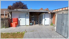 Immeuble à usage de commerce et d'habitation vendu loué