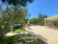 Maison familiale d'environ 100 m2 avec piscine, terrain arboré et grand garage au calme de la campagne ardéchoise