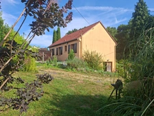 Maison évolutive, secteur la Ferté Macé, 3 chambres, sur sous sol, parc de 3000 m2 arboré et clos.