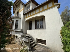 Charming house with garden and garage