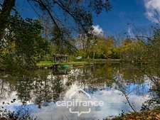 ? Terrain de loisirs avec étang – 11 110 m² – Maigné