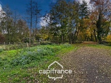 ? Terrain de loisirs avec étang – 11 110 m² – Maigné