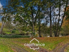 ? Terrain de loisirs avec étang – 11 110 m² – Maigné