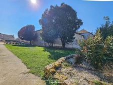 Maison avec jardin – 3 chambres – Cave – Double garage – Grenier aménageable